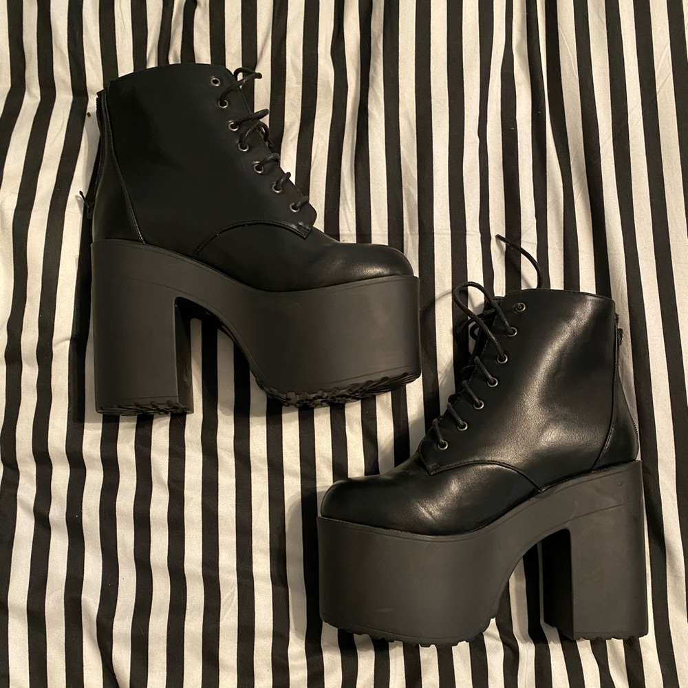 Black platform heeled boots